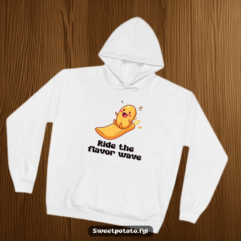 Funny excited sweet potato zooming down a crisp slide, wearing a cozy and humorous hoodie.
