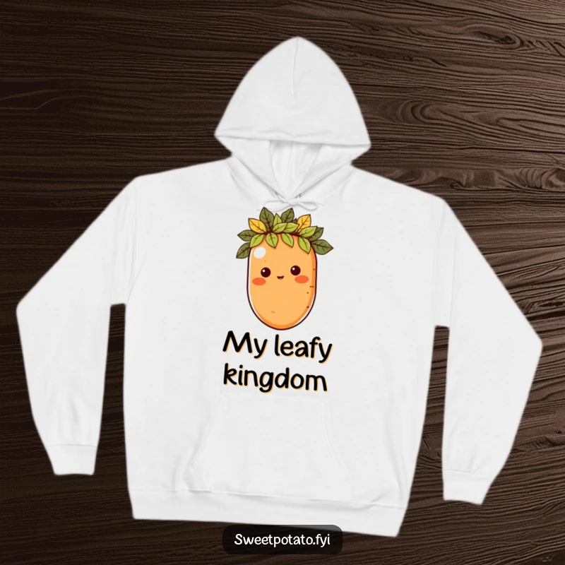 Funny hoodie with a sweet potato character wearing a leaf crown, offering cozy comfort and a touch of majestic humor.