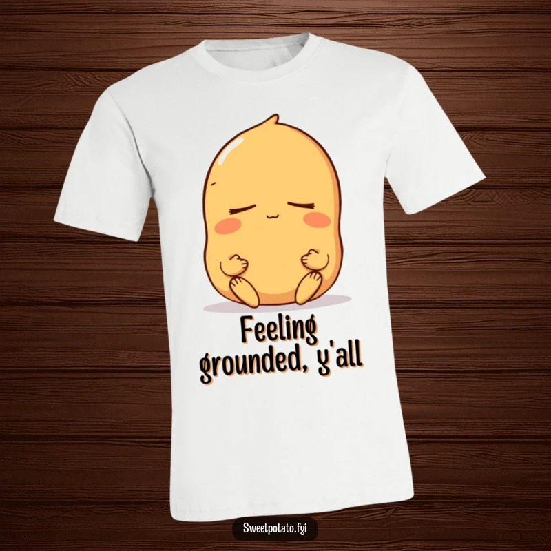 Funny sweet potato t-shirt with a peaceful character meditating with eyes closed, exuding tranquility and mindful relaxation.