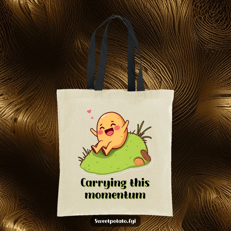Funny giggling sweet potato character sliding down a grassy hill, on a stylish and humorous tote bag.