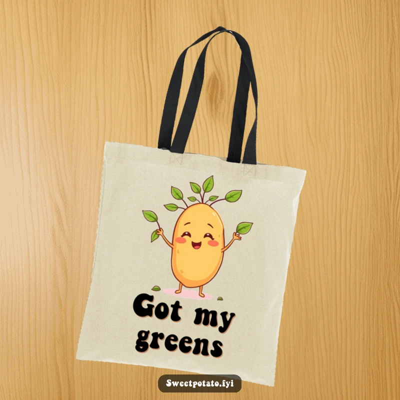 Funny tote bag showing a sweet potato character juggling leaves, perfect for carrying groceries with a smile.